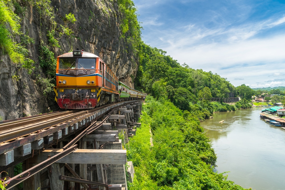 Thai,Train,On,River,Kwai,Bridge,Of,Kanchanaburi,,Thailand.